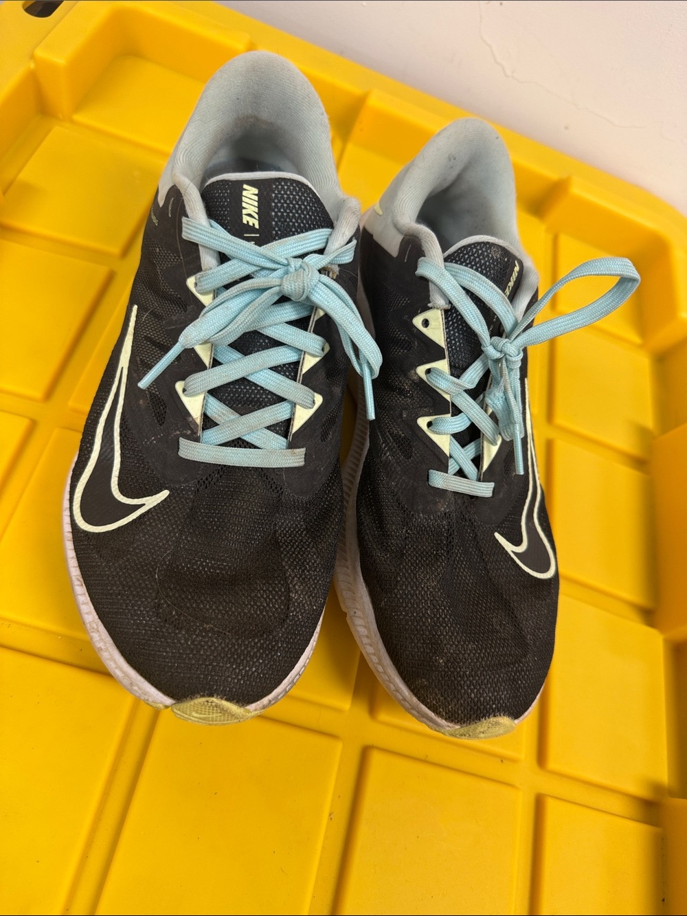 Nike Black Athletic Sneakers with Light Blue Laces